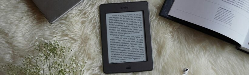 A person reading an ebook on a laptop, illustrating a digital gift in exchange for an annual donation