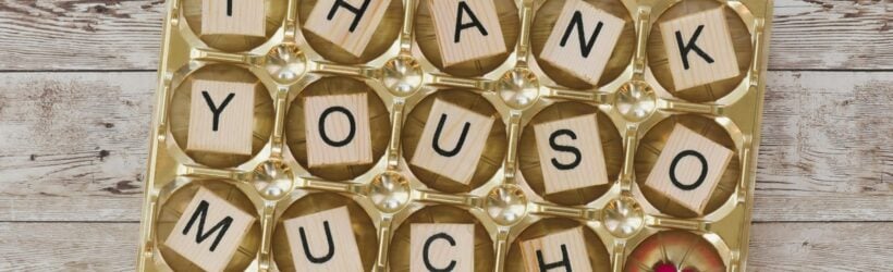 A thank-you note and a small gift, illustrating donor-focused appreciation