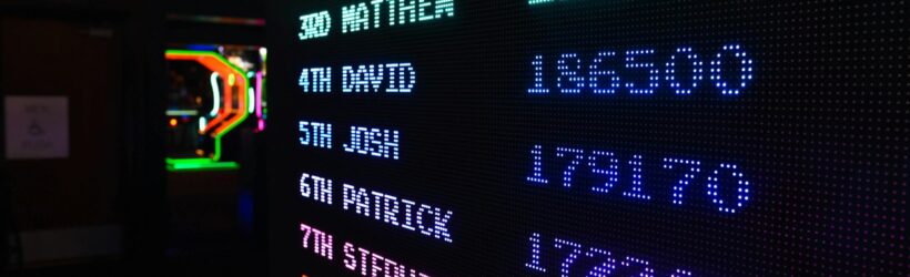 A leaderboard or scoreboard, illustrating a friendly fundraising competition between two nonprofits