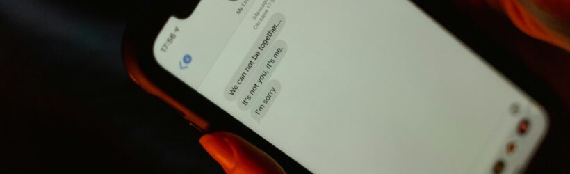 A smartphone showing a text message, illustrating a text-to-give donation campaign