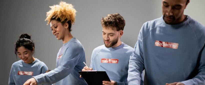 Charity volunteers whose work is funded by a long-term corporate sponsorship