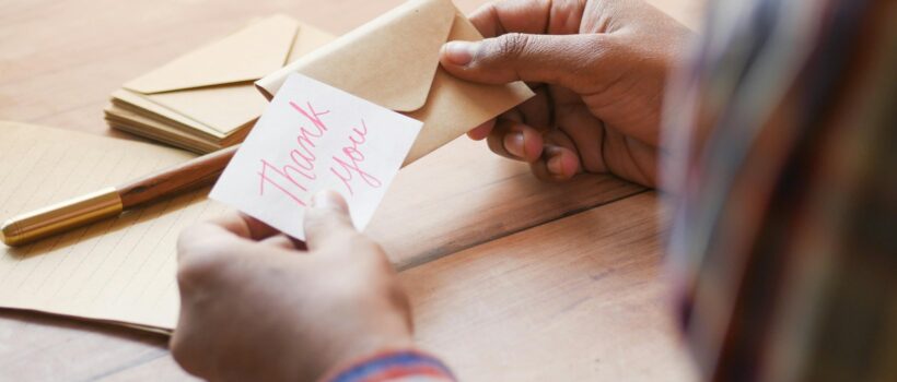 A handwritten thank you card in pink ink, the kind of fast personal acknowledgement that consistently lifts donor relationships