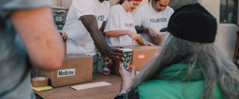 Nonprofit volunteers working together, the supporters a donor survey helps you understand