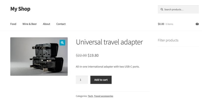 WooCommerce product page for a universal travel adapter showing a wholesale sale price with the retail price crossed out