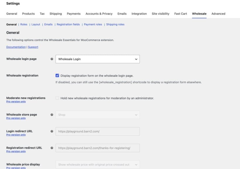 WooCommerce Wholesale general settings showing login page, registration options and fields labelled Pro version only
