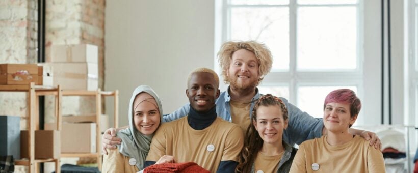A diverse group of nonprofit volunteers who feel part of the brand